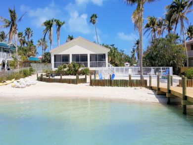 A Rare Beach Home with Sandy Beach At Door. A Rare Beach Home with Sandy Beach At Door.